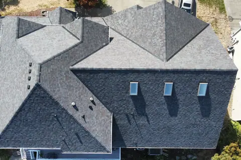 A completed Malarkey Vista roof in Puyallup with skylights re-flashed, seen from above