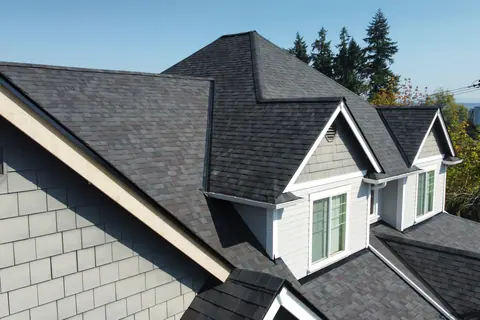 New Malarkey Vista shingles beside shake siding on a Puyallup home